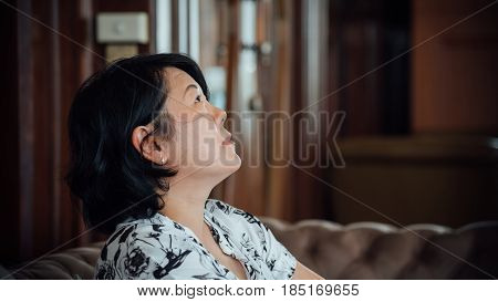 Asia Women Look Up In Coffee Shop Vintage Style