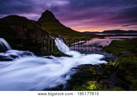 The Kirkjufell volcano the coast of Snaefellsnes peninsula. Fantastic and gorgeous scene. Location Kirkjufellsfoss, Iceland, sightseeing Europe. Unique place on earth. Explore the world's beauty.