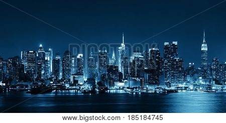 Midtown Manhattan skyline in black and white at dusk panorama over Hudson River