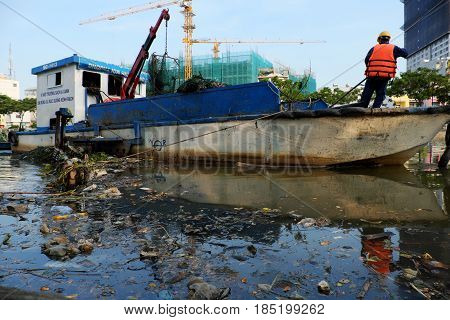 Sanitation Worker Picking Up Trash