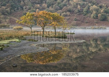 Stunning Winter Foggy Sunrise On Crummock Water In Lake District England