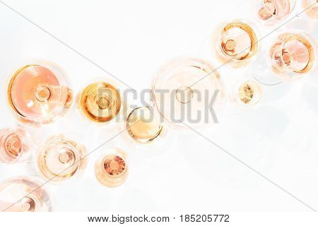 Many Glasses Of Rose Wine At Wine Tasting. Concept Of Rose Wine And Variety