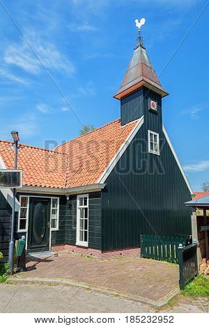 De Woude, Netherlands, April 30, 2017: The small church of the village De Woude which is located on an island in the Alkmaarder and Uitgeester lake in The Netherlands