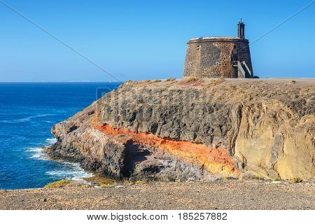 Castle Castillo De Las Coloradas On Cliff In Playa Blanca, Lanzarote, Canary Islands, Spain