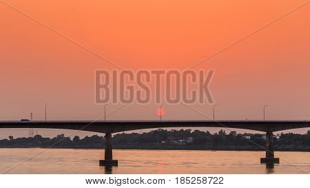 Bridge across the Mekong River at sunset. Thai-Lao friendship bridge at Nong Khai Thailand