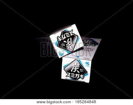 GOMEL, BELARUS - MARCH 5, 2017:Japanese toothpaste Kobayashi with charcoal.Kobayashi Pharmaceutical Co., Ltd. manufactures and sells OTC pharmaceuticals, oral hygiene products.