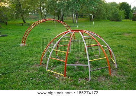 Colorful monkey bars on an old schoolyard