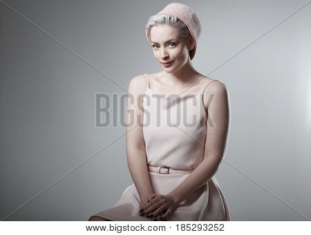 Smiling woman in retro style .