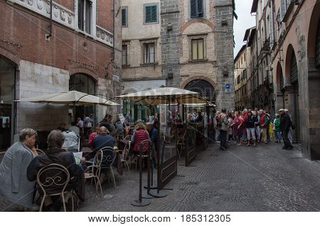 Italy Lucca - September 18 2016: the view of open air cafe on lucca's street on September 18 2016 in Lucca Tuscany Italy.
