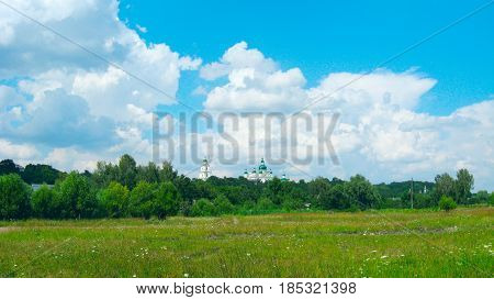 view to Chernihiv town with beautiful Troizkiy monastery and country field. Sky field and monastery