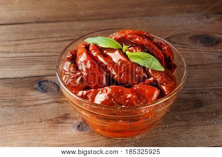Italian Appetizer - Sundried Tomato In Bowl On The Wooden Table