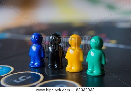 Multi-colored Chips For Tabletop Game In The Form Of Little Men