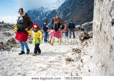 YUMTHANG VALLEYSIKKIMINDIA -APRIL 18:The tourist at yumthang valley snow field in North Sikkim on April 182012 in Yumthang valleySikkimIndia .