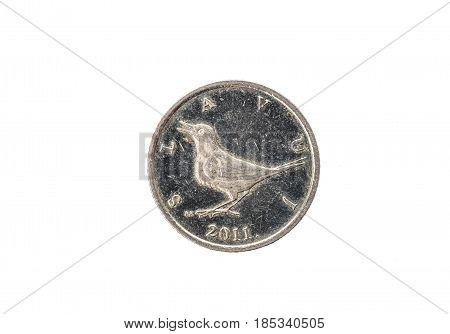 Old used and worn out 1 kuna coin. Coin of croatian currency for one kuna isolated on white. High resolution picture.