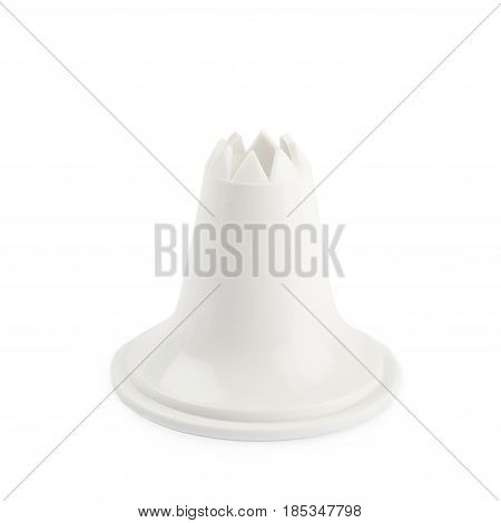 Decorational cream piping bag's plastic tip isolated over the white background