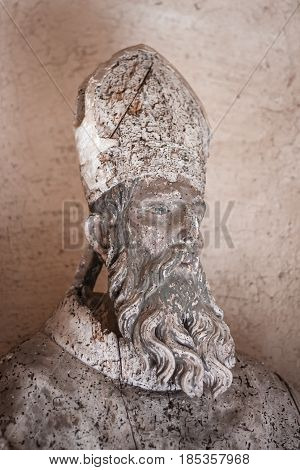 Wooden statue at Villa Cimbrone in Ravello on the Amalfi Coast to convey a concept of tourism and culture