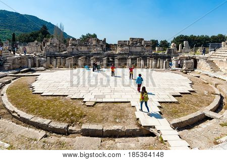 EPHESUS, TURKEY - APRIL 13 : Tourists in Ephesus Turkey on April 13, 2015. Ephesus contains the ancient largest collection of Roman ruins in the eastern Mediterranean