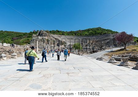 EPHESUS, TURKEY - APRIL 13 : A group of tourists in Ephesus Turkey on April 13, 2015. Ephesus contains the ancient largest collection of Roman ruins in the eastern Mediterranean.
