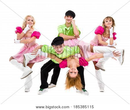 dancer team wearing wearing a folk russian costume posing against isolated white background