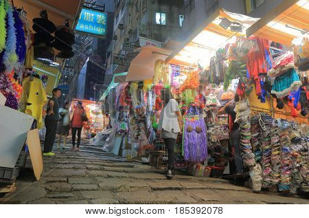 HONG KONG - NOVEMBER 8, 2016: Unidentified people visit Lan Kwai Fong night market. Lan Kwai Fong is a popular expatriate haunt in Hong Kong for drinking, clubbing and dining.