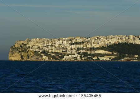 Peschici promontory from  seaside in summer during sunset