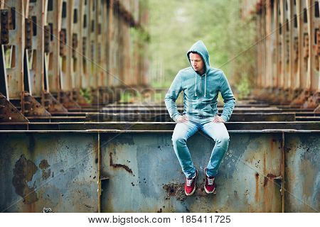 Sad Man On The Abandoned Bridge