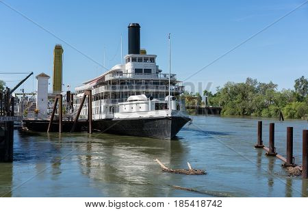 SACRAMENTO, CALIFORNIA - APRIL 23: Restored Delta King Paddleboat moored on April 23, 2017. The boat was totally restored in 1989.