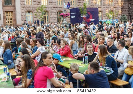 People are resting in the fan zone of Eurovision 2017 on Khreshchatyk Street in Kiev. Eurovision Village. Eurovision opening in Ukraine. May 7 2017