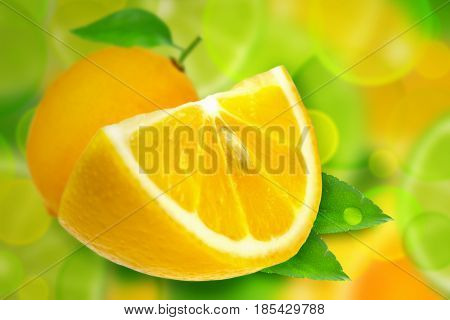 Two whole fruit lemon and slices with leaves