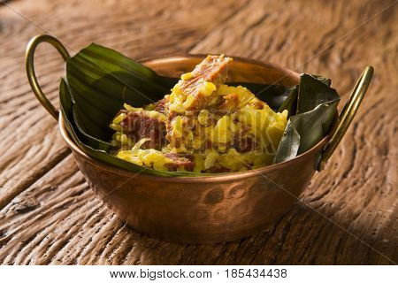 Dried Meat With Rice In An Old Copper Pot - Traditional Bahia Food