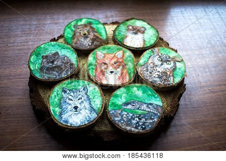 Collection Of Painted Forest Animals On A Cut Pieces Of Wood. Beautiful Natural Paint Colors. Backgr