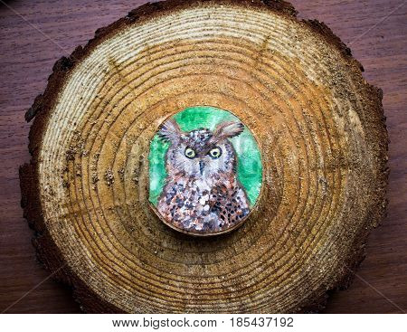 Painted Forest Animal On A Cut Piece Of Wood. Beautiful Natural Paint Colors. Background Of Brown Wo