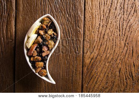 Delicious appetizer of tropeiro beans. Typical food in Brazil