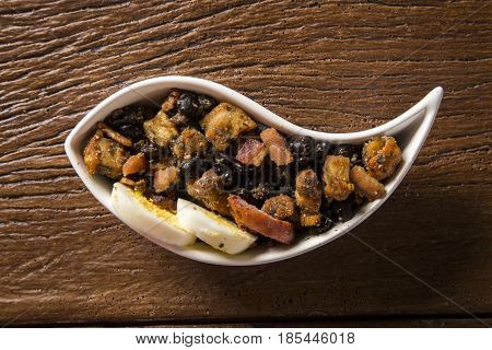 Delicious appetizer of tropeiro beans. Typical food in Brazil