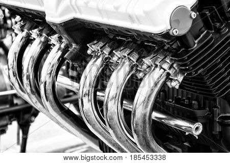 BERLIN - MAY 11: The exhaust system of the old bike (black and white) 26th Oldtimer-Tage Berlin-Brandenburg May 11 2013 Berlin Germany