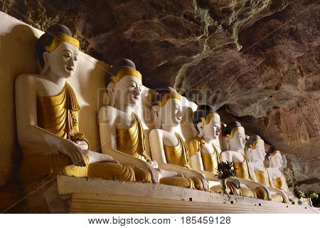 Row Of Buddha Statues Inside Sacred Yathaypyan Cave In Hpa-an, Myanmar (burma).