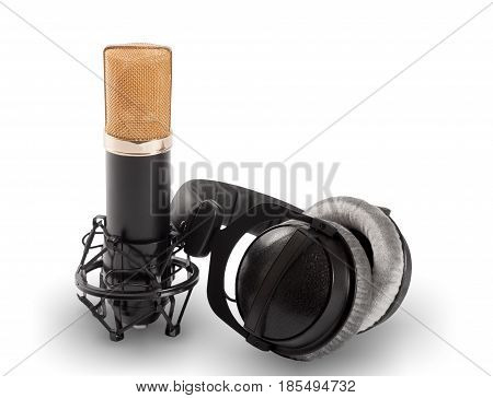 Headphones and condenser microphone isolated on the white background.