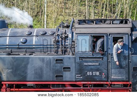 BOCHUM , GERMANY - APRIL 18 2015 : Worker observing the activities at the railway station