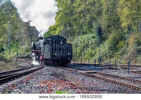 BOCHUM , GERMANY - APRIL 18 2015 : Steam train passing the station in Bochum-Dahlhausen