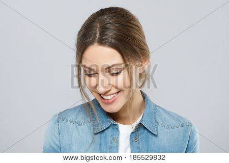 Portrait Of Beautiful European Lady With Simple Hairstyle And Light Everyday Makeup Isolated On Grey