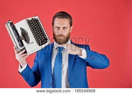 Business Man In Blue Suit And Tie With Typewriter