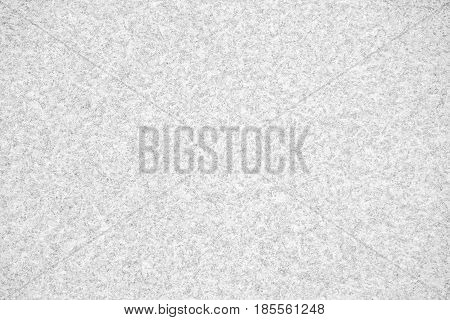 closeup detail of abstract white granite texture light gray (grey) rough grain surface for background backdrop or design element in architectural material concepts