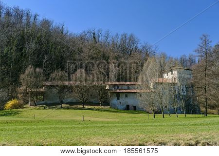 The medeival abbey of Torba (Varese Lombardy Italy) seen from the bicycle path in the Olona valley
