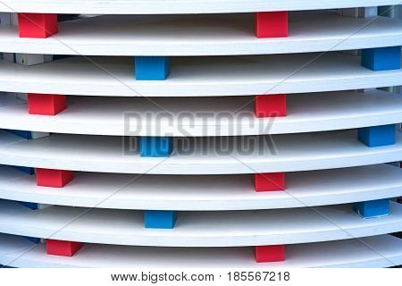 Ipe wood fence installation witrh red and blue colors.