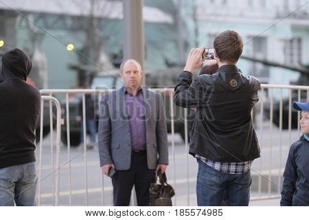 Moscow, Russia - May, 3, 2017: People photograph military parade repetition on Tverskaya street in a center of Moscow