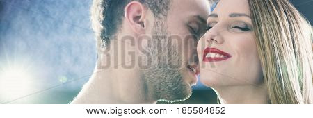 Man Kissing His Girlfriend's Neck