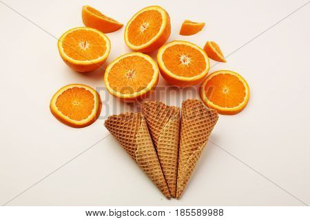 Cones And Colorful ,orange Slice , Setup On White Background . Summer And Sweet Menu Concept Flat La