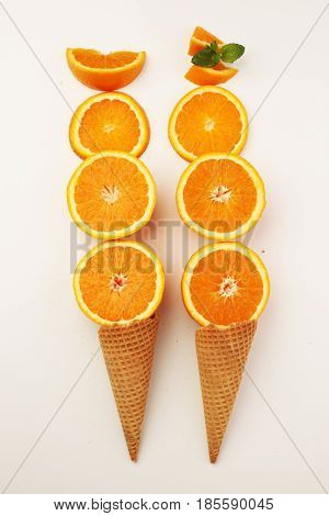 Cones And Colorful ,orange Slice , Setup On White Background . S