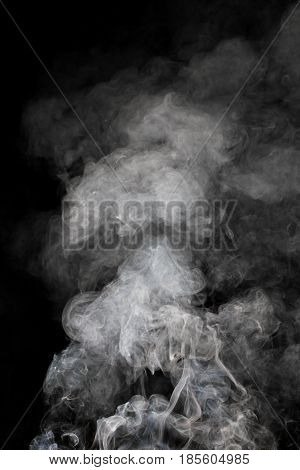 green smoke on a black background . Photo texture