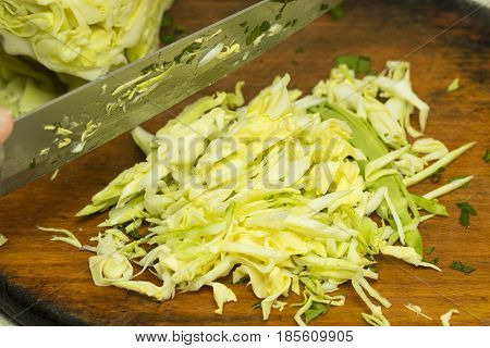 Sliced Cabbage ,shredded Cabbage On The Board. Isolated